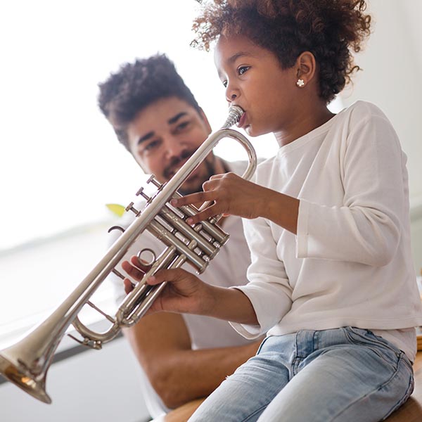 child playing trumpet